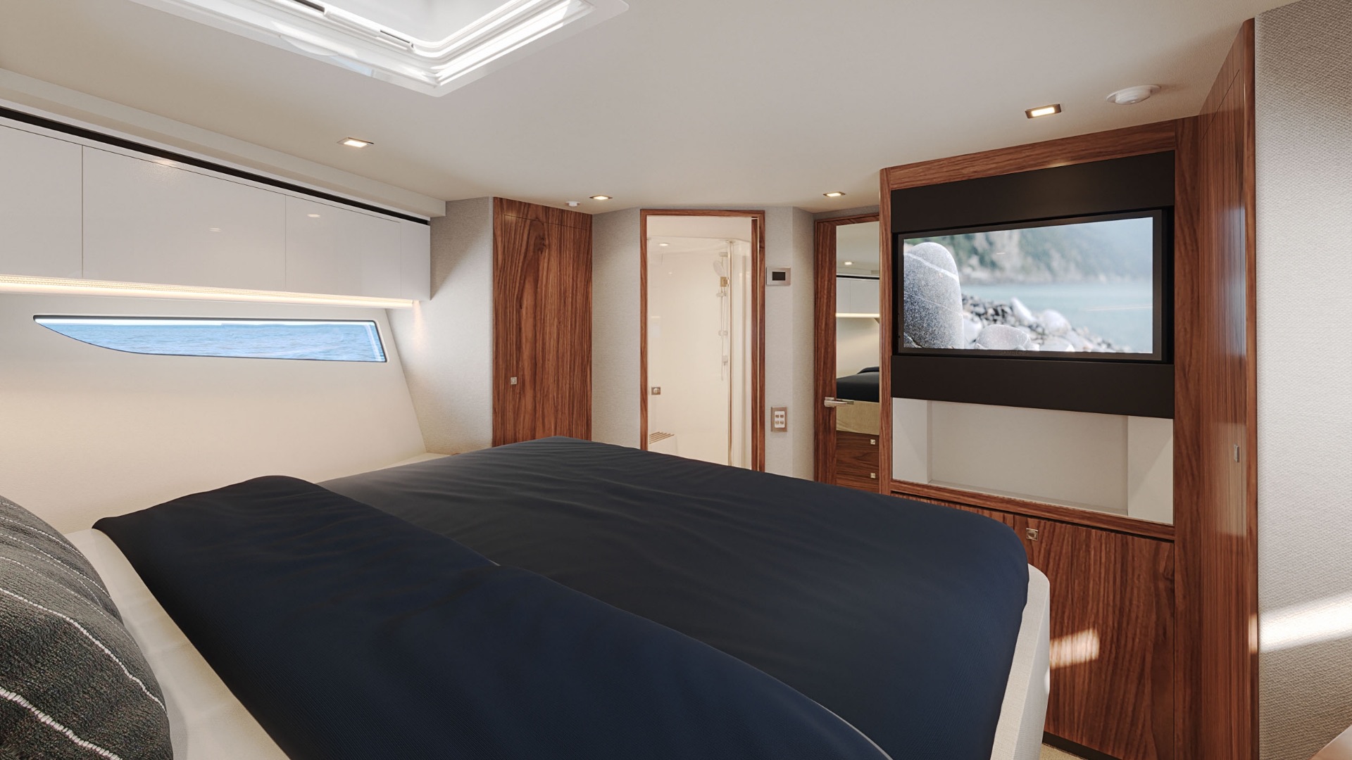 Forward VIP stateroom aboard the Riviera 6200 Sport Yacht
